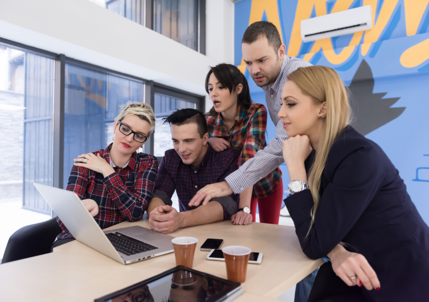 Group of young adults in a business